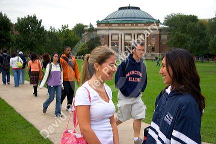 Female students socialize on the campus of the University of Illinois at Champaign.