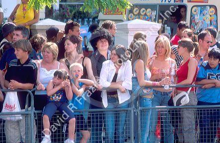 Crowd watching Nottinghill festival parade in London, England.