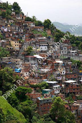 Hillside favela in Rio de Janeiro, Brazil. These slums are home to thousands of poor people squatting on public land.