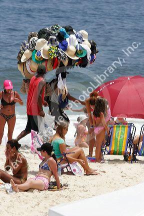 Vendor selling beach apparel at Ipanema Beach in Rio de Janeiro, Brazil.