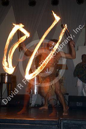 A Brazilian man dances with fire at a nightclub in Sao Paulo, Brazil.