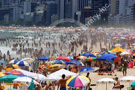 Crowed beach scene at the Ipanema Beach in Rio de Janeiro, Brazil.