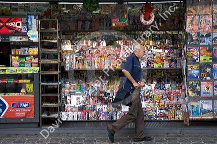 A man walks past a newsstand in the Liberdade asian section of Sao Paulo, Brazil.