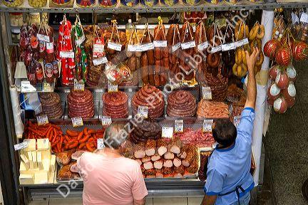 A variety of sausages and meat being sold at the Mercado Municipal in Sao Paulo, Brazil.