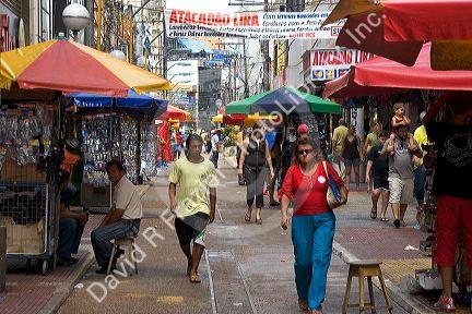 Walking street with vendors selling miscellaneous items in Manaus, Brazil.