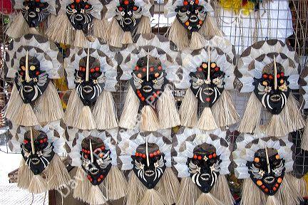 Amazon masks made of fish scales and bones by indians in Manaus, Brazil.