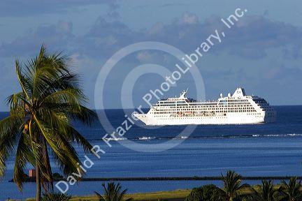 The Paul Gaugin cruise ship off the island of Tahiti.