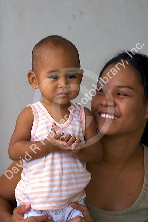 Tahitian mother and child on the island of Moorea.