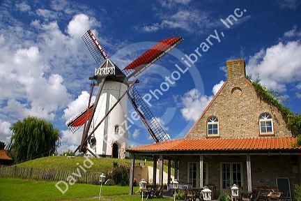A windmill and old stone restaurant in the town of Ramskapelle in the municipality of Knokke-Heist located in the province of West Flanders, Belgium.