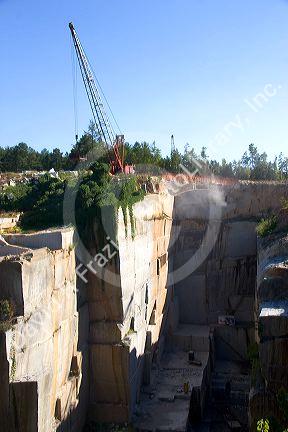Workers drilling and cutting blocks at a granite quarry in Elberton, Georgia.