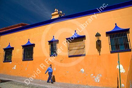 The colorful wall of a building at Cuernavaca in the State of Morelos, Mexico.