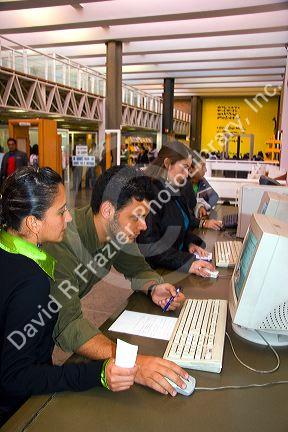 Students study on computers in the library at the National Autonomous University of Mexico Faculty of Architecture in Mexico City, Mexico.