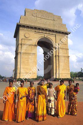 Women and children tourists in front of the India Gate in New Delhi, India.