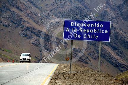 Road sign welcoming you to Chile on the Argentina border in the Andes Mountain Range.