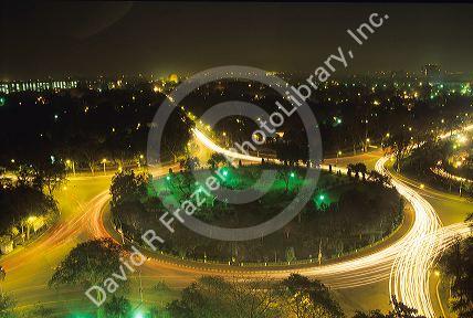 Night time exposure of New Delhi traffic circle in India.