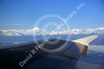 View out the window of an airplane of the Andes Mountain Range, Argentina.