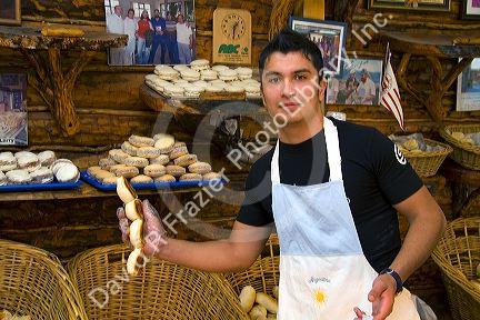 Young man working at the Panaderia Union bakery in Tolhuin, Tierra del Fuego, Argentina.