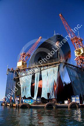 Floating dry dock with container ship in the Port at Valparaiso, Chile.