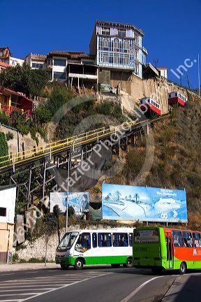 Tram-like vehicles are part of a funicular railway at Valparaiso, Chile.