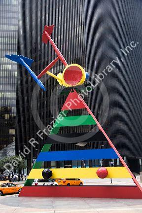 Public art sculpture named Personage and Birds by Joan Miro in front of the JP Morgan Chase Tower in downtown Houston, Texas.