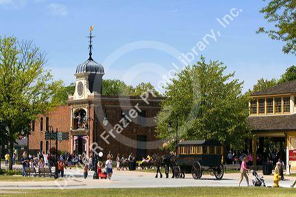 Street scene with an Omnibus and the Sir John Bennett Sweet Shop in Greenfield Village at The Henry Ford in Dearborn, Michigan.