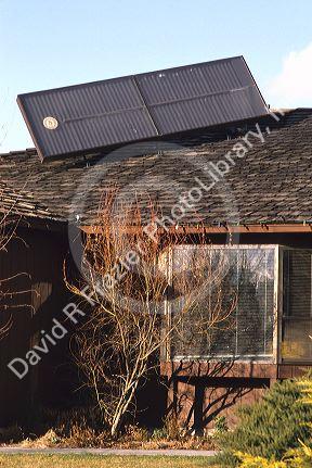 House with a solar panel on the roof.