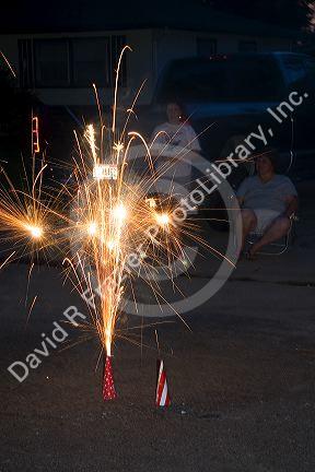 Consumer fireworks lit for Fourth of July neighborhood celebration in Boise, Idaho.