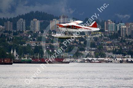 Seaplane flying at Port Vancouver in British Columbia, Canada.