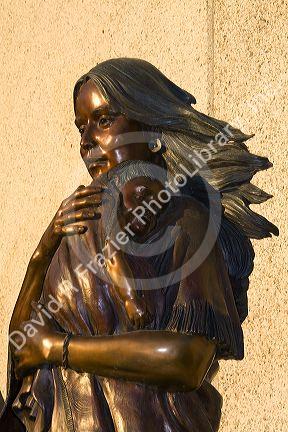 Bronze sculpture of Shoshone woman Sacagawea in front of the Idaho Historical Museum in Boise, Idaho.