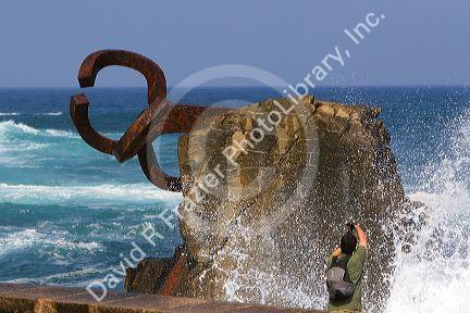 Water spraying from a blowhole in La Concha Bay in the city of Donostia-San Sebastian, Guipuzcoa, Basque Country, Northern Spain.