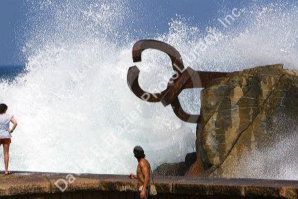 Water spraying from a blowhole in La Concha Bay in the city of Donostia-San Sebastian, Guipuzcoa, Basque Country, Northern Spain.