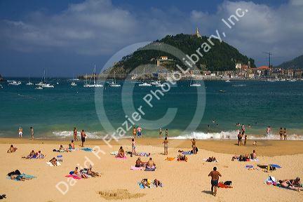 Beach scene at La Concha Bay in the city of Donostia-San Sebastian, Guipuzcoa, Basque Country, Northern Spain.