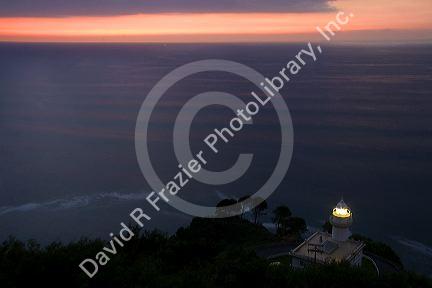 Monte Igueldo Lighthouse at sunset in La Concha Bay near the city of Donostia-San Sebastian, Guipuzcoa, Basque Country, Northern Spain.