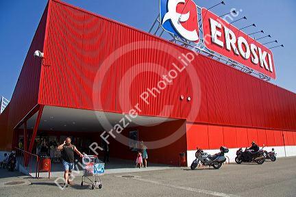 Customers outside the Eroski supermarket in the town of Castro Urdiales, Cantabria, northern Spain.