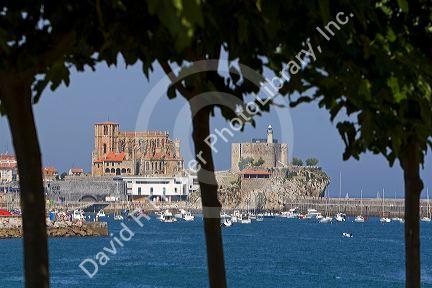 Church of Santa Maria and castle lighthouse in the harbor at Castro Urdiales, Cantabria, northern Spain.
