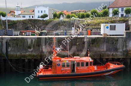 Maritime rescue vessel in the harbor at Llanes, Asturias, Spain.