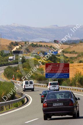 Automobiles travel on the Autopista near Pamplona, Navarre, northern Spain.