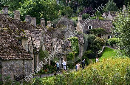 Cotswold stone cottages in the village of Bibury, Gloucestershire, England.