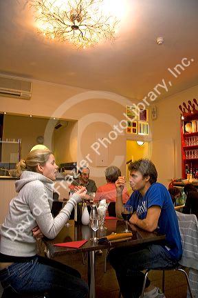 A couple eating ice cream at a cafe in the city of Bath, Somerset, England.