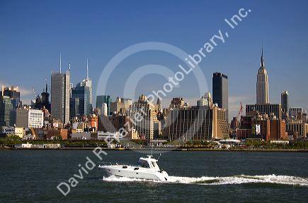 Pleasure boat on the Hudson River and New York City, New York, USA.
