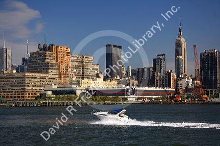 Pleasure boat on the Hudson River and New York City, New York, USA.