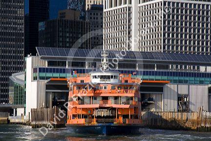 Staten Island Ferry docked near Battery Park, New York City, New York, USA.