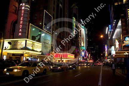 Times Square at night in Manhattan, New York City, New York, USA.