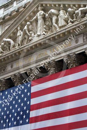 American flag hangs in front of the New York Stock Exchange in New York City, New York, USA.
