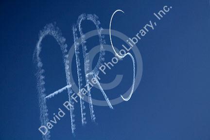 Small airplane sky writing over Boise, Idaho, USA.