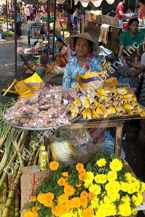 Woman selling items in the Cholon district of Ho Chi Minh City, Vietnam.