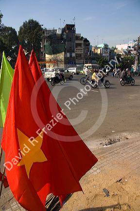 The flag of Vietnam being sold along the street in Ho Chi Minh City, Vietnam.