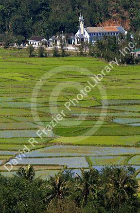 Catholic church and rice paddies south of Hue, Vietnam.