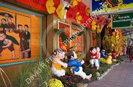 Tet decorations in front of a business in Ho Chi Minh City, Vietnam.