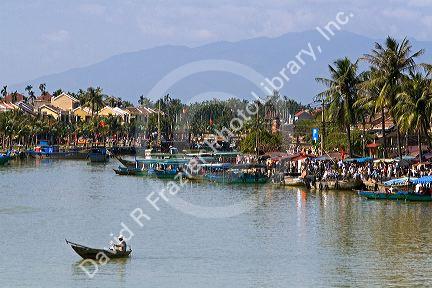 Boats on the Thu Bon River at Hoi An, Vietnam.